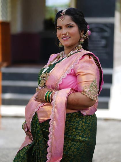 A happy, glowing portrait from the baby shower. The makeup is designed to be photogenic, ensuring every picture is a cherished memory.