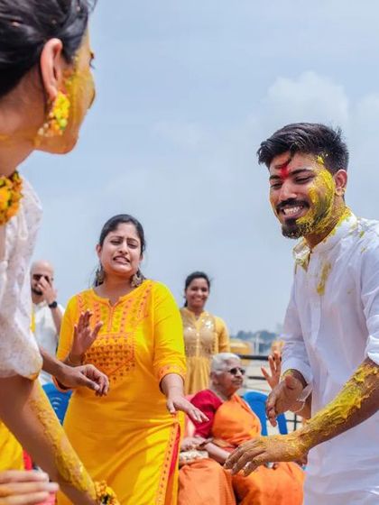 A duplicate of 298, capturing the joyful dance and interaction between the couple at their Haldi.