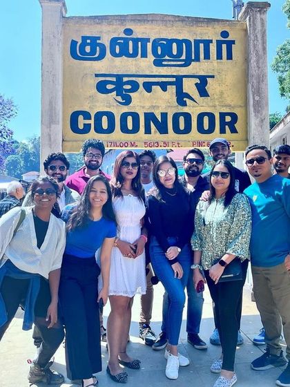 A mandatory group picture at the iconic Coonoor railway station sign during our Ooty trip. Capturing memories from the Nilgiri hills.