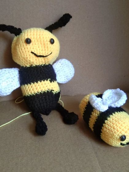 Meet my mommy and baby bee amigurumi set. These plush, smiling bees are great as toys or as companions for a bee-themed baby photoshoot.