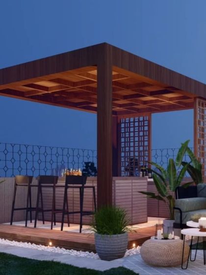Imagine a bar and entertainment area right on your terrace. This design features a sleek wooden pergola with an integrated bar counter, providing a stylish and functional space for hosting guests.