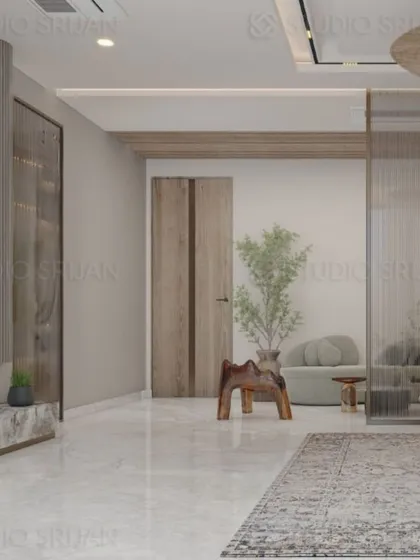 A bedroom in Patel Nagar, New Delhi, with a clean, minimalist aesthetic, marble flooring, and simple, elegant furniture.