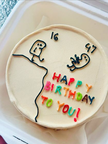 A funny and relatable meme cake about age. The simple stick figure illustrations and colorful text make this bento cake a guaranteed hit.