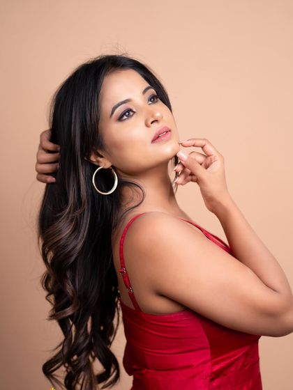 A thoughtful and serene portrait, adding emotional range to the studio collection.