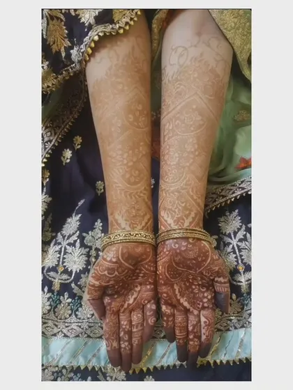 The final stain on both arms, showing the complete bridal look. My designs are created to be symmetrical and complementary, providing a beautiful, cohesive look for your big day.