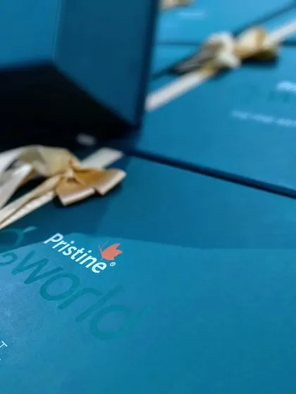 A close-up on the subtle, tone-on-tone branding for the Pristine Developers corporate hampers. This demonstrates my ability to create sophisticated and understated designs that reflect a premium brand image.