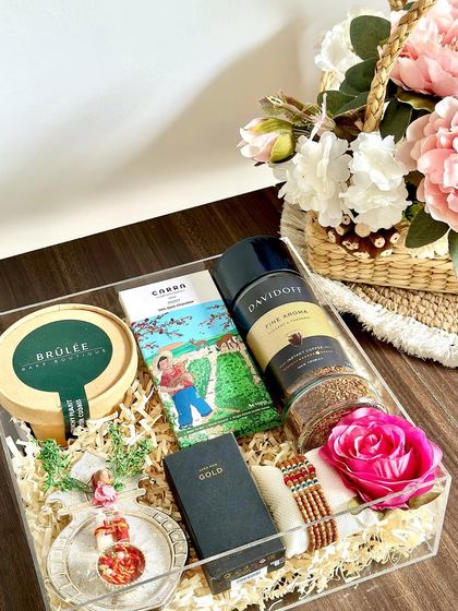 A still shot of our premium acrylic Rakhi hamper, perfect for making a grand gesture this Rakshabandhan.