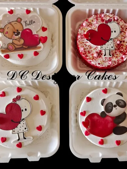 A collection of cute Valentine's Day bento cakes. Each one has a unique design, featuring teddy bears, pandas, and hearts.