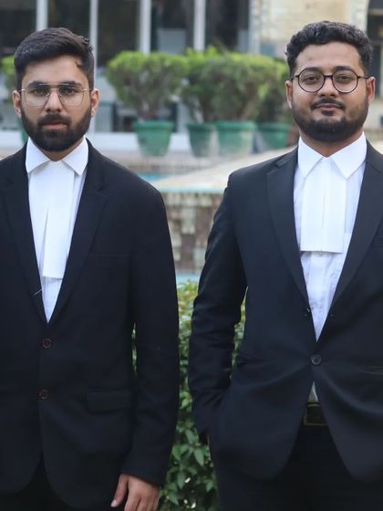 A professional portrait with a colleague. Our goal is to turn injustice into justice and transform weaknesses into strengths for our clients.