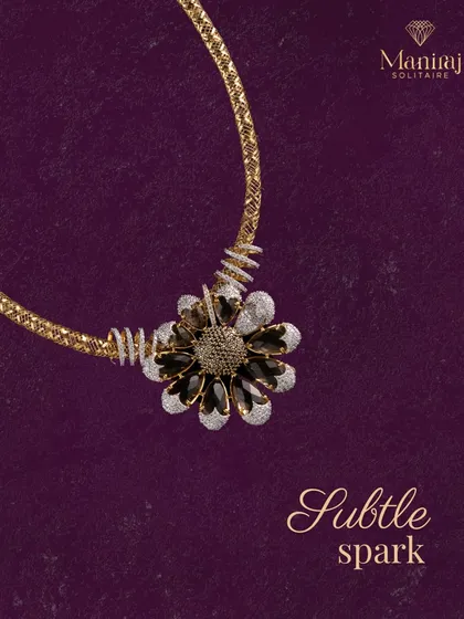 Shine bright with this gold necklace featuring a stunning black and white floral diamond pendant. It's a simple yet stunning piece that adds the perfect touch to any look.