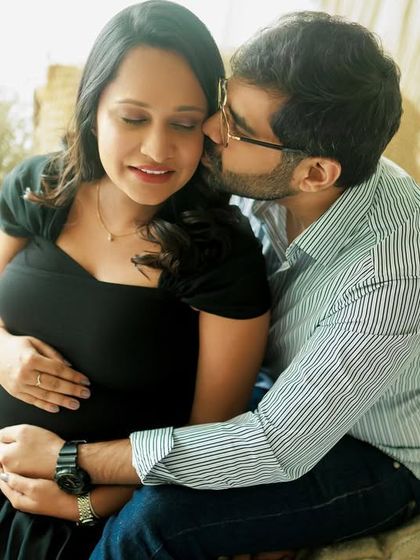 A tender kiss, a gentle touch. These are the small gestures that tell the biggest stories of love. This is a perfect, heartfelt moment.