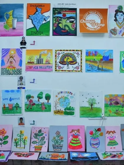 A gallery wall displaying the incredible artwork created by our students during the 2023 summer camp. The exhibition features a variety of themes and mediums, from paintings about nature to drawings of cultural icons.