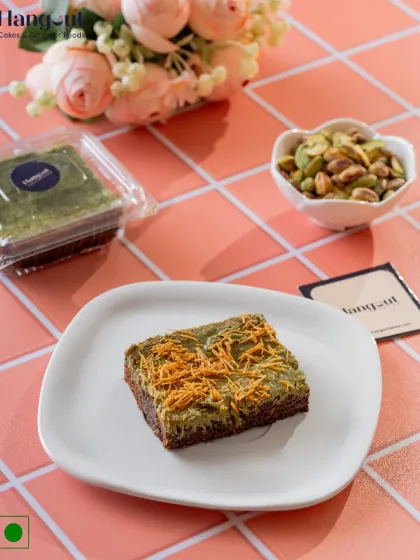 When the skies pour, pour yourself some joy with our Kunafa Brownie. This dessert combines a rich brownie base with a crispy, crunchy kunafa topping for a delightful textural contrast.