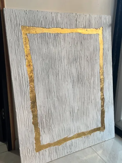 The textured gold leaf piece in my studio before shipping. The vertical texture adds a subtle pattern that contrasts beautifully with the metallic border.