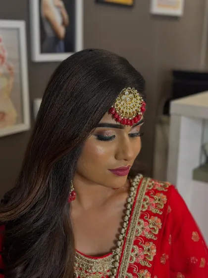 A close-up of the Muslim bridal makeup, focusing on the dramatic eye makeup and glowing skin achieved by our student.