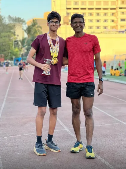 Standing with one of our tallented athletes and his impressive collection of medals and a trophy. It's a privilege to coach such determined individuals.