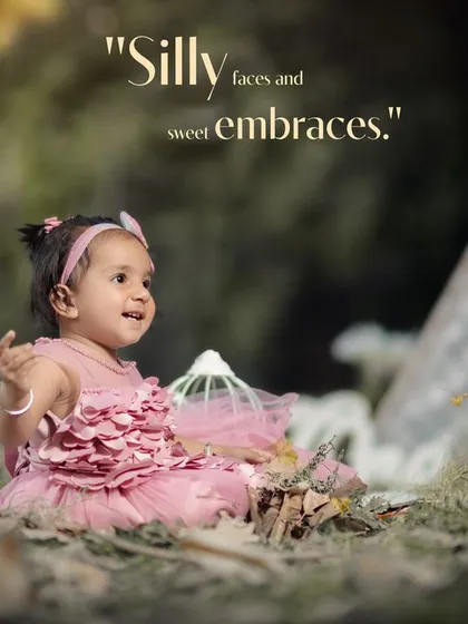 Silly faces and sweet embraces. A candid moment of a little girl playing in the leaves during her outdoor photoshoot.