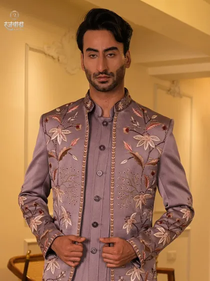 A closer look at the mauve Jodhpuri, highlighting the delicate beadwork and thread art along the placket and collar. Every detail is meticulously placed for a refined finish.