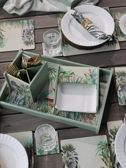 A closer view of our Savanna-themed tablescape, showing how the coordinated cutlery stand, napkin holder, and placemats create a cohesive and stylish dining experience.