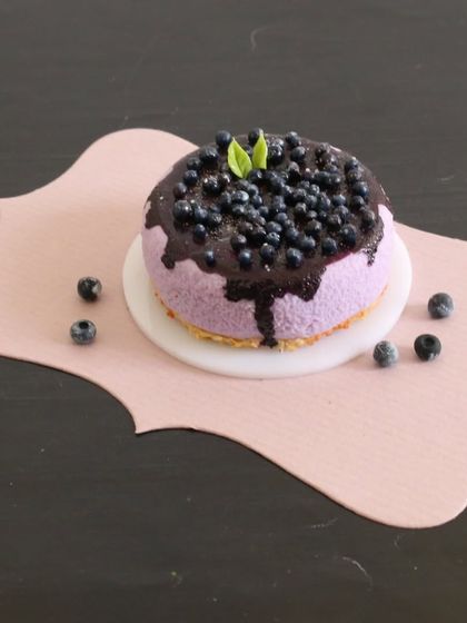 A close-up of my miniature blueberry cheesecake, a perfect tiny dessert.