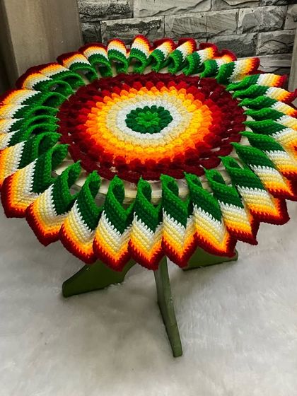 A side view of the colorful 'Tatavaracha Rumal', showing how the petals stand up to create a beautiful 3D effect.