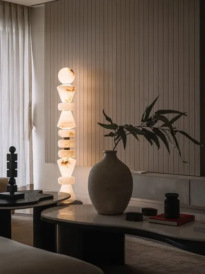 The 'Joy' totem, inspired by Morse code, is one of our favorite creations. This illuminated sculpture, seen here in the Kanso House, is a constant, gentle reminder to find joy in the everyday.
