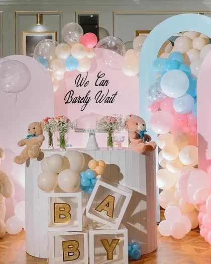 Our "We Can Barely Wait" teddy bear theme is a classic for a reason. This baby shower setup combines soft pink, blue, and cream balloons with adorable teddy bears and custom "BABY" blocks to create a sweet and welcoming atmosphere for the parents-to-be.