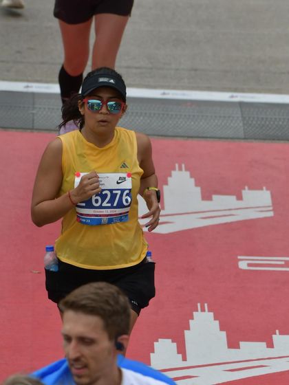 In the thick of the Chicago Marathon. This photo captures the intense focus required during a race, pushing through the crowds and the pain to reach the finish line.