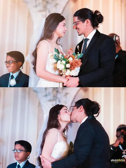 The moment they say "I do". We capture the emotional peak of a Christian wedding ceremony, focusing on the couple's expressions as they seal their vows with a kiss.