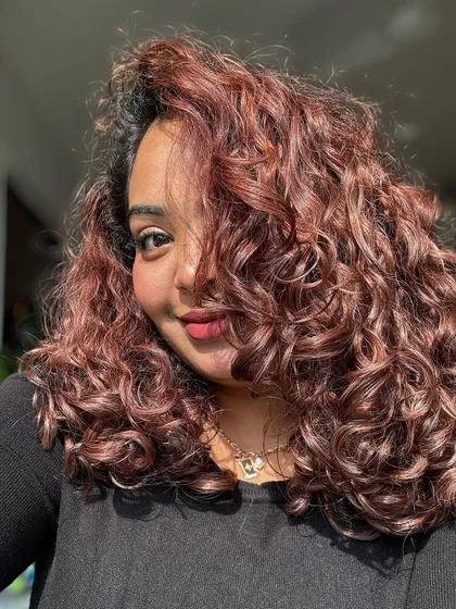 A collection of my other no-bleach balayage and color work, showcasing a variety of tones from subtle browns to vibrant reds on different curl types.