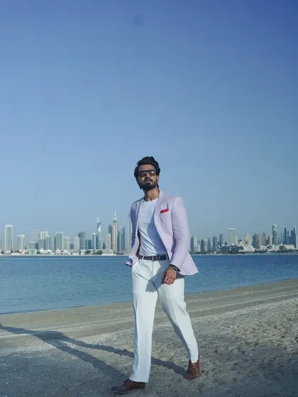 Another shot of my beach walk in Dubai. The combination of a sharp suit and a beach setting is the essence of a modern destination wedding.