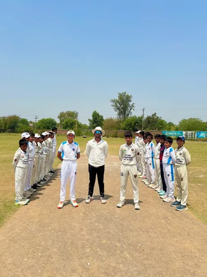 The two teams lined up before the 2nd match of the Summer Cricket Cup.