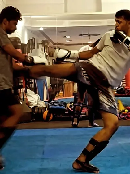 Sparring drills are key to improving timing and distance. Here, I'm practicing a side kick counter during a striking round at the Ippon Institute, focusing on maintaining form under pressure.