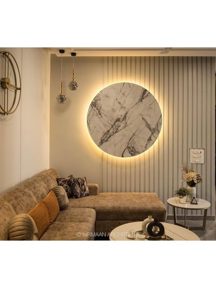 Another perspective of the living room at KVK Camellia, showing the thoughtful placement of lighting and decor to create a balanced and harmonious space.