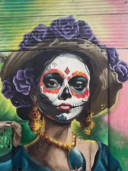The full view of the Day of the Dead themed mural for Cafe Panama. The goal was to create something beautiful and intricate that would draw customers in.