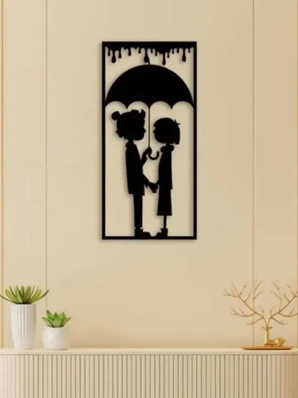 A charming silhouette of a couple under an umbrella, this iron wall art is a sweet and romantic piece. The simple black finish allows the story to shine, making it a perfect gift or addition to a bedroom.