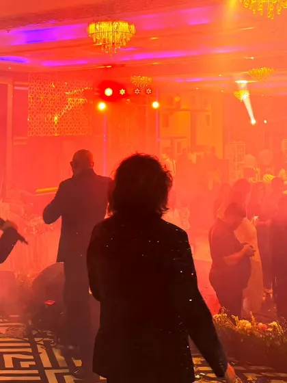 A shot from the stage during a high-energy performance by our DJ-based band, 'Bolly Factor Forever'. We provide live entertainment that keeps the crowd on their feet all night long at weddings and cocktail parties.