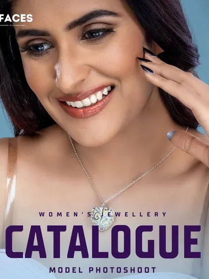 A close-up on a model wearing a modern silver-toned pendant. The direct and happy expression makes the product feel accessible and desirable for an online store.