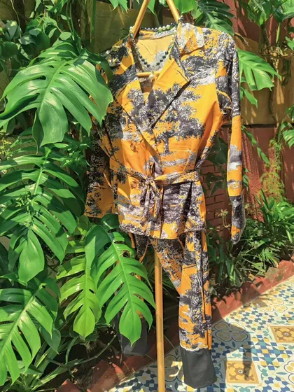 This printed co-ord set with a matching belt is part of my Autumn collection. The shirt and pants can be worn together for a statement look or separately for more versatile styling options.