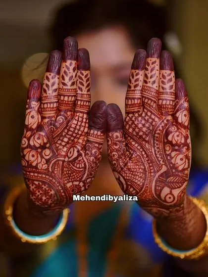 A close-up of the palms showing the incredible depth of the henna stain. This is the magic of natural henna.