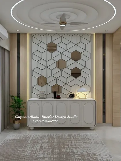 A close-up of the console table and the geometric mirror wall, showcasing the intricate details and the play of reflections.