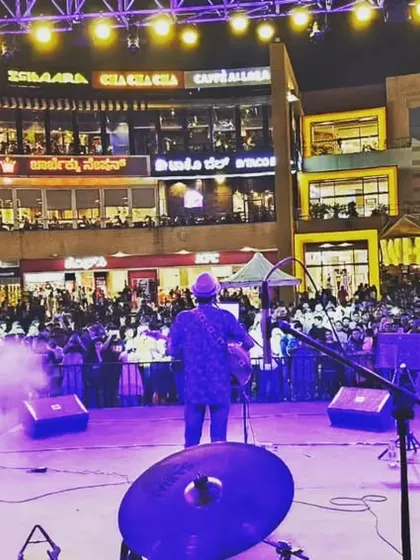 The view from our stage at Phoenix Marketcity, with the crowd lit up and the air buzzing with energy. We thrive on creating these large-scale concert experiences, turning public spaces into unforgettable parties.