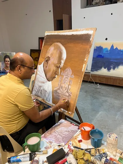 Another view of me at work on this large spiritual painting, with my materials ready.