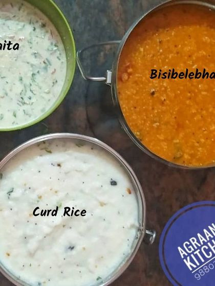A light yet filling lunch combination featuring my special bisibelebath, creamy curd rice, and a side of fresh raita. This is a popular choice for a quick and satisfying midday meal.
