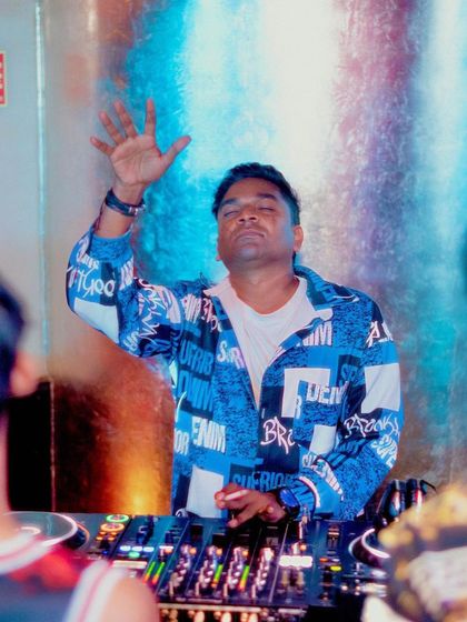 Feeling the music and connecting with the crowd. A simple gesture can create a powerful bond during a set.