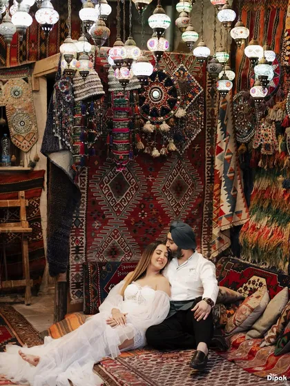 An intimate and atmospheric shot of a couple in a traditional Turkish lamp shop. This photo demonstrates how I use unique cultural settings and lighting to create warm, romantic, and memorable pre-wedding pictures.