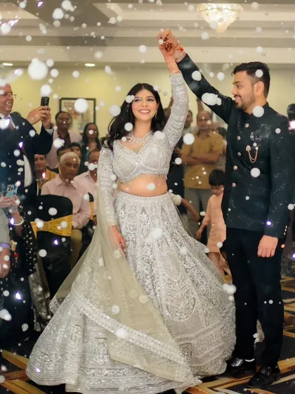 The couple's first dance, surrounded by bubbles. Her makeup is set to be picture-perfect through every activity.