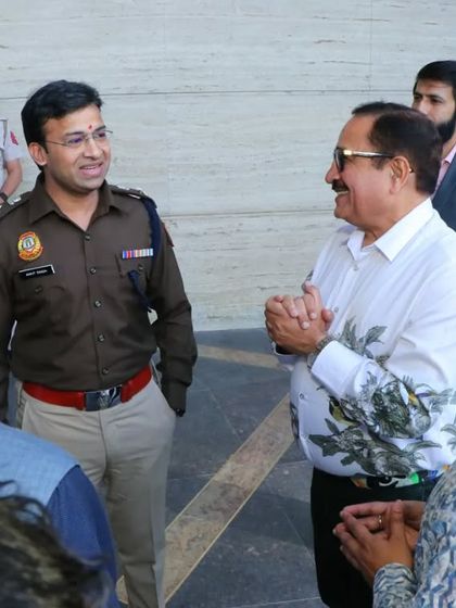 A moment of interaction with our chief guests at the exhibition, discussing the importance of art and creativity.