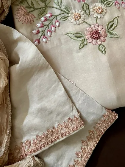 A detail shot of the embroidered lower, part of the custom festive set.