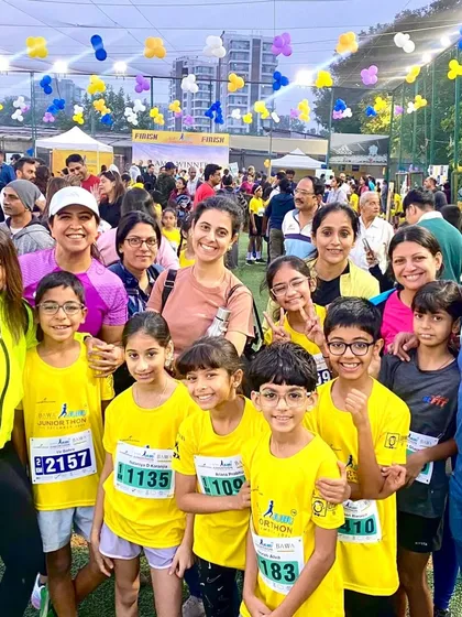 The team and parents celebrating a successful day at the Bawa Juhu Juniorthon. The support from our community is everything.